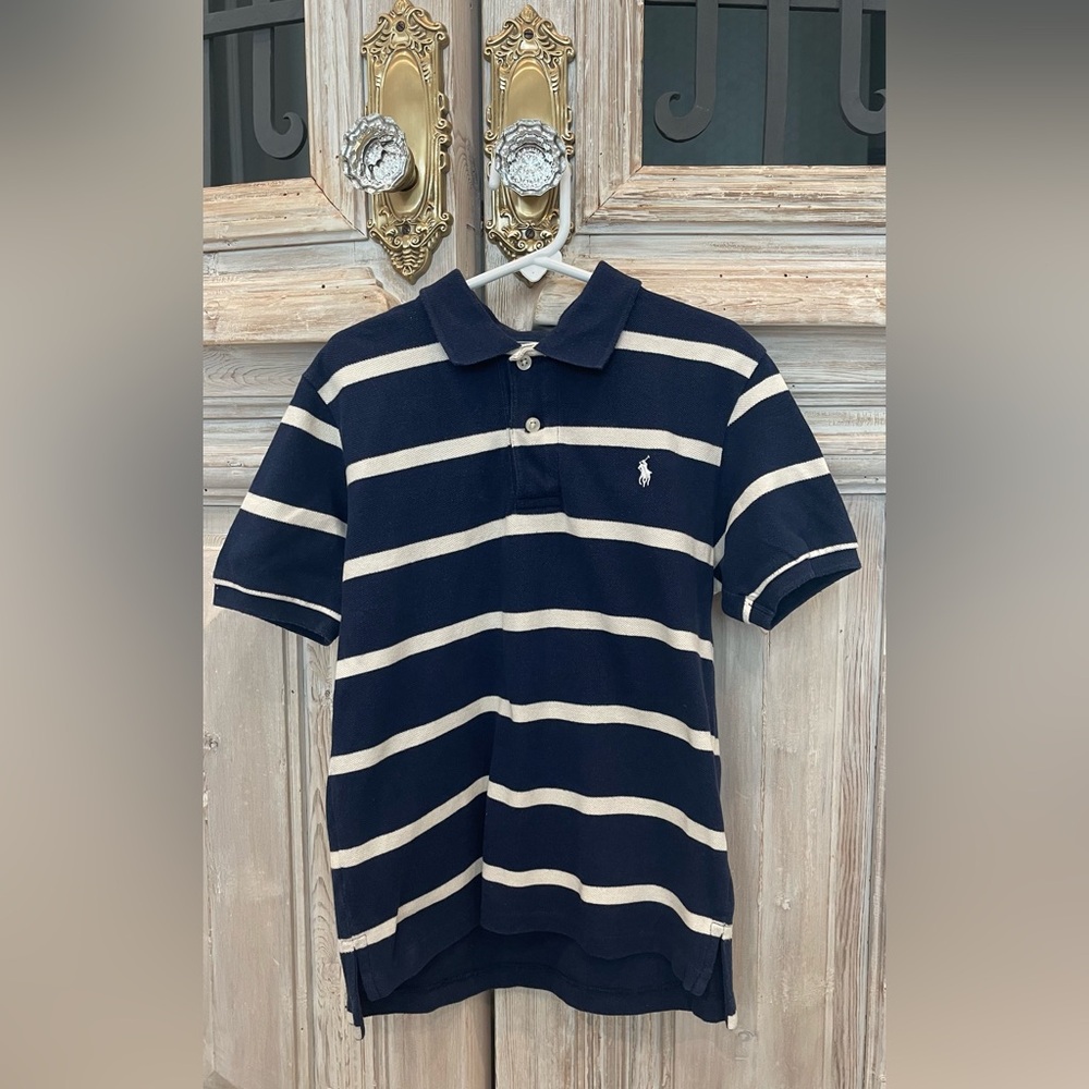Polo by Ralph Lauren 
Boys size 6
Navy with white stripes and  White horse